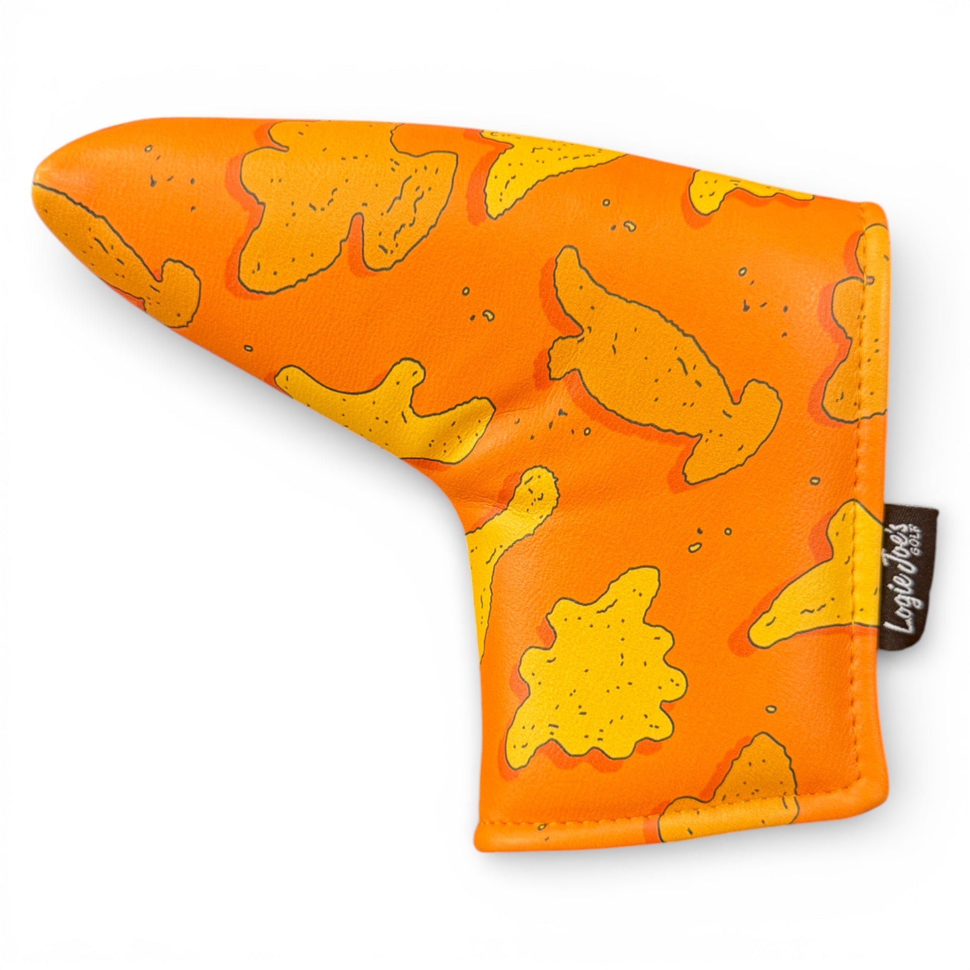 The Dino Nugget Blade Putter Headcover features orange synthetic leather with yellow, fish-shaped cracker designs and a black Loviegolf tag, inspired by playful snack shapes. Premium magnetic cover with soft protective interior.