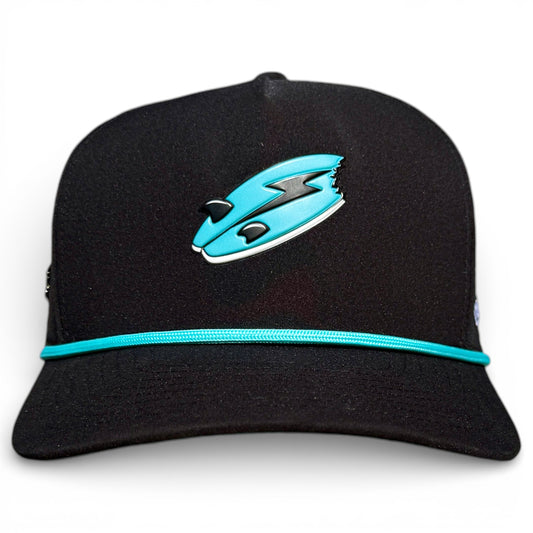 The Shark Bite Golf Hat is a black adjustable snapback cap with a teal lightning bolt logo, accent stripe, and includes a built-in magnetic golf ball marker holder with marker. One size fits most.
