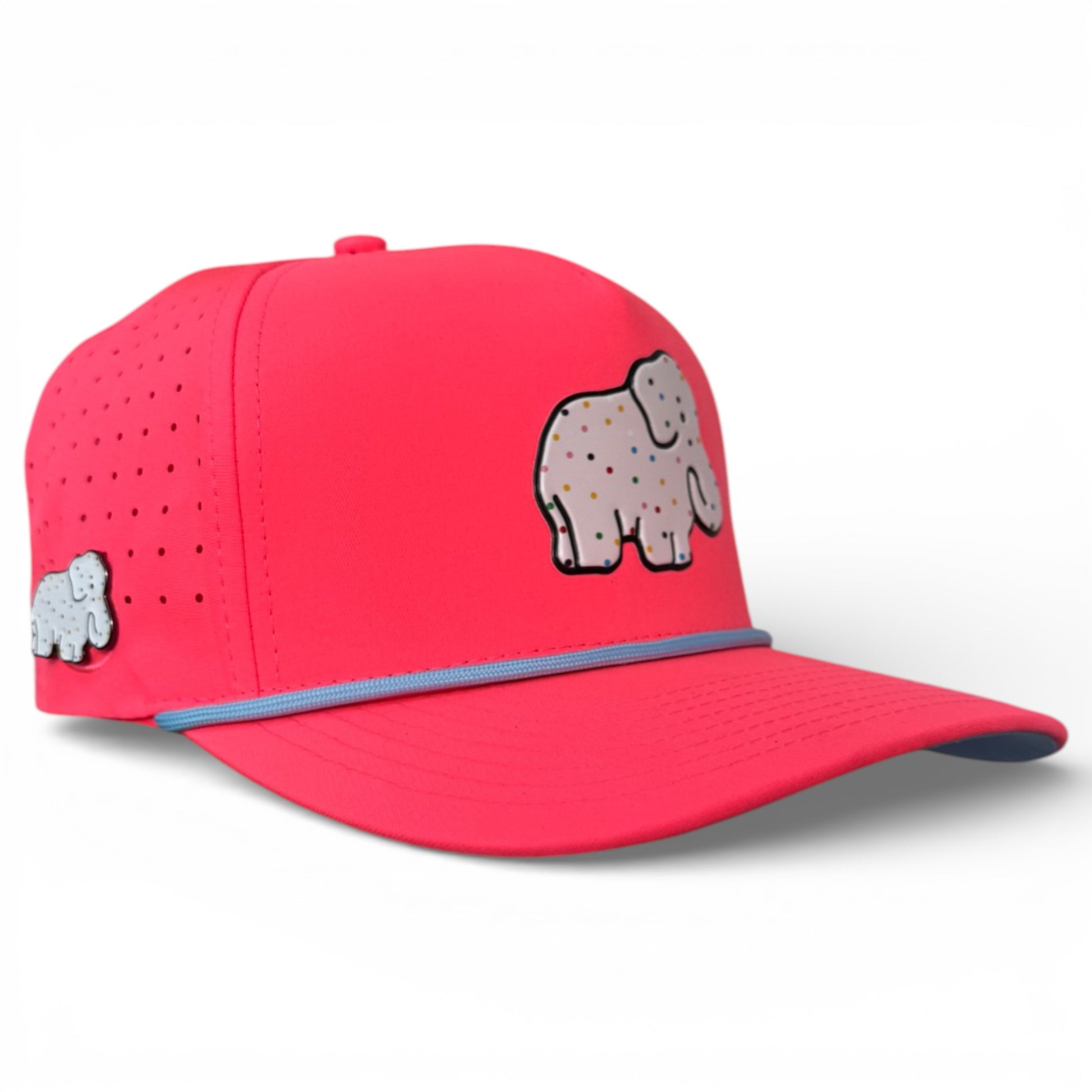 The Frosted Elephant Golf Hat in Elephant Cookie Pink is an adjustable snapback cap with a built-in magnetic ball marker holder (marker included), decorated with colorful cartoon elephants—perfect for golfers’ accessories.