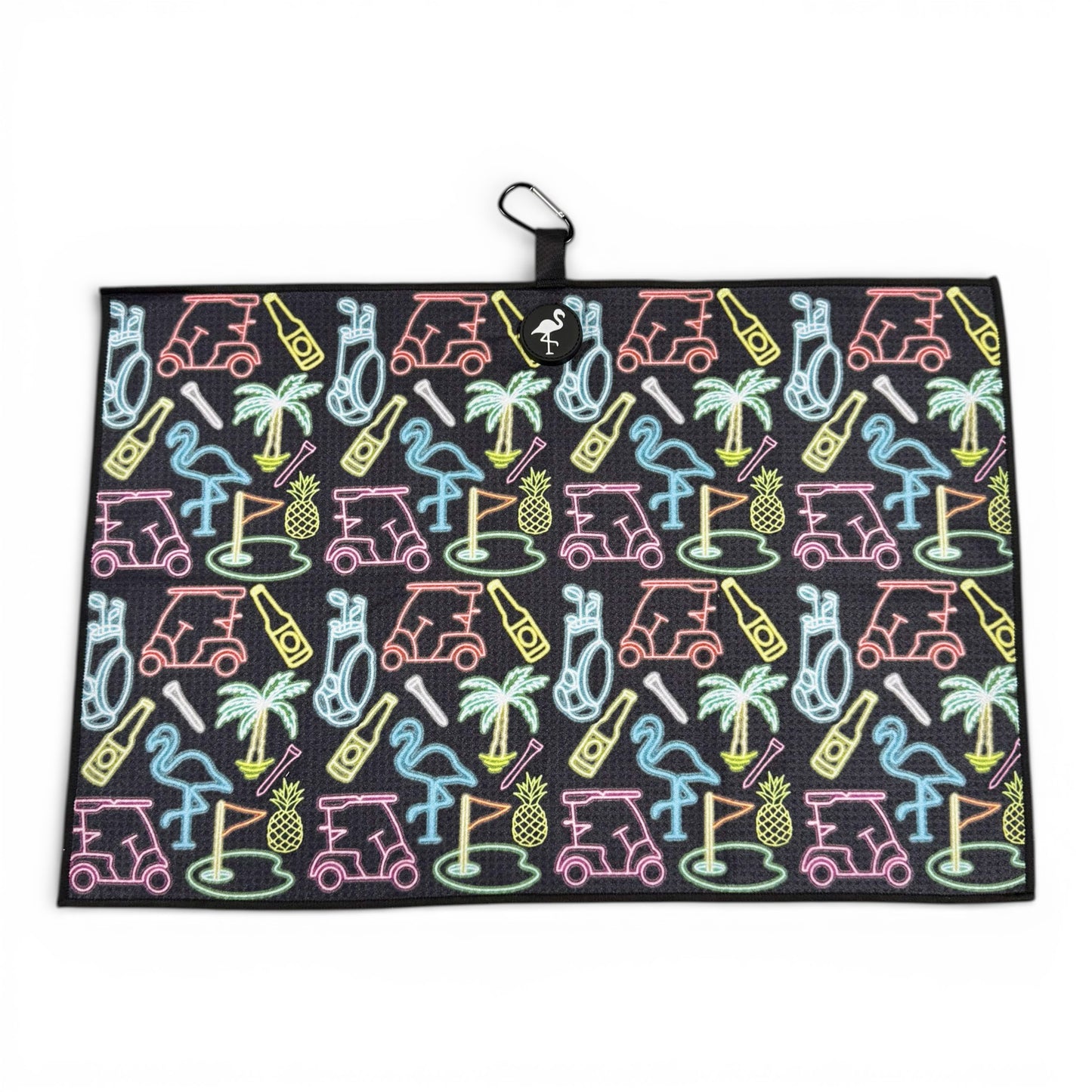 The Miami Slice Golf Towel (24x16 in) features a neon-style print with carts, clubs, flamingos, palm trees, pineapples & golf holes. Made of premium double-sided microfiber with a magnetic back & carabiner clip for easy hanging.