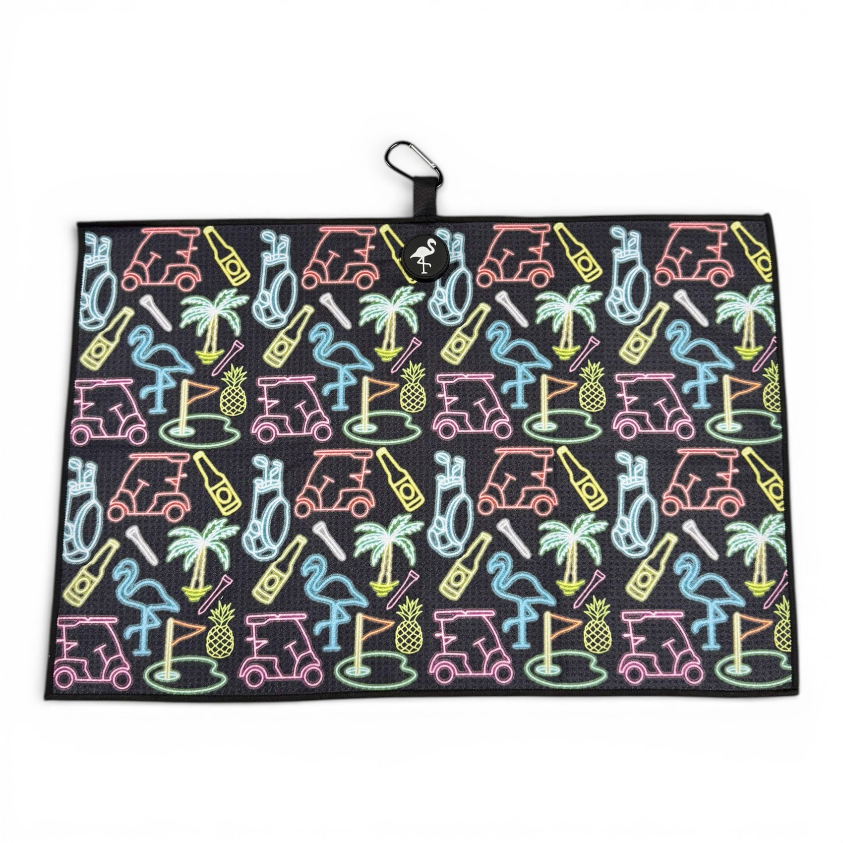 The Miami Slice Golf Towel (24x16 in) features a neon-style print with carts, clubs, flamingos, palm trees, pineapples & golf holes. Made of premium double-sided microfiber with a magnetic back & carabiner clip for easy hanging.