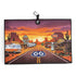 The Route 66 Golf Towel is a premium double-sided microfiber towel (24x16 in) with a magnetic holder and carabiner clip, featuring desert highway art with vintage cars—ideal for golfers seeking style and functionality.