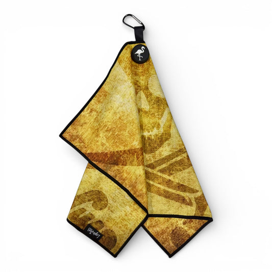 The Pirate Skull Golf Towel is a yellow-brown, double-sided 24 x 16 in microfiber towel featuring a vintage skull and crossbones, black trim, magnetic carabiner clip, and black tag, shown against a white background.