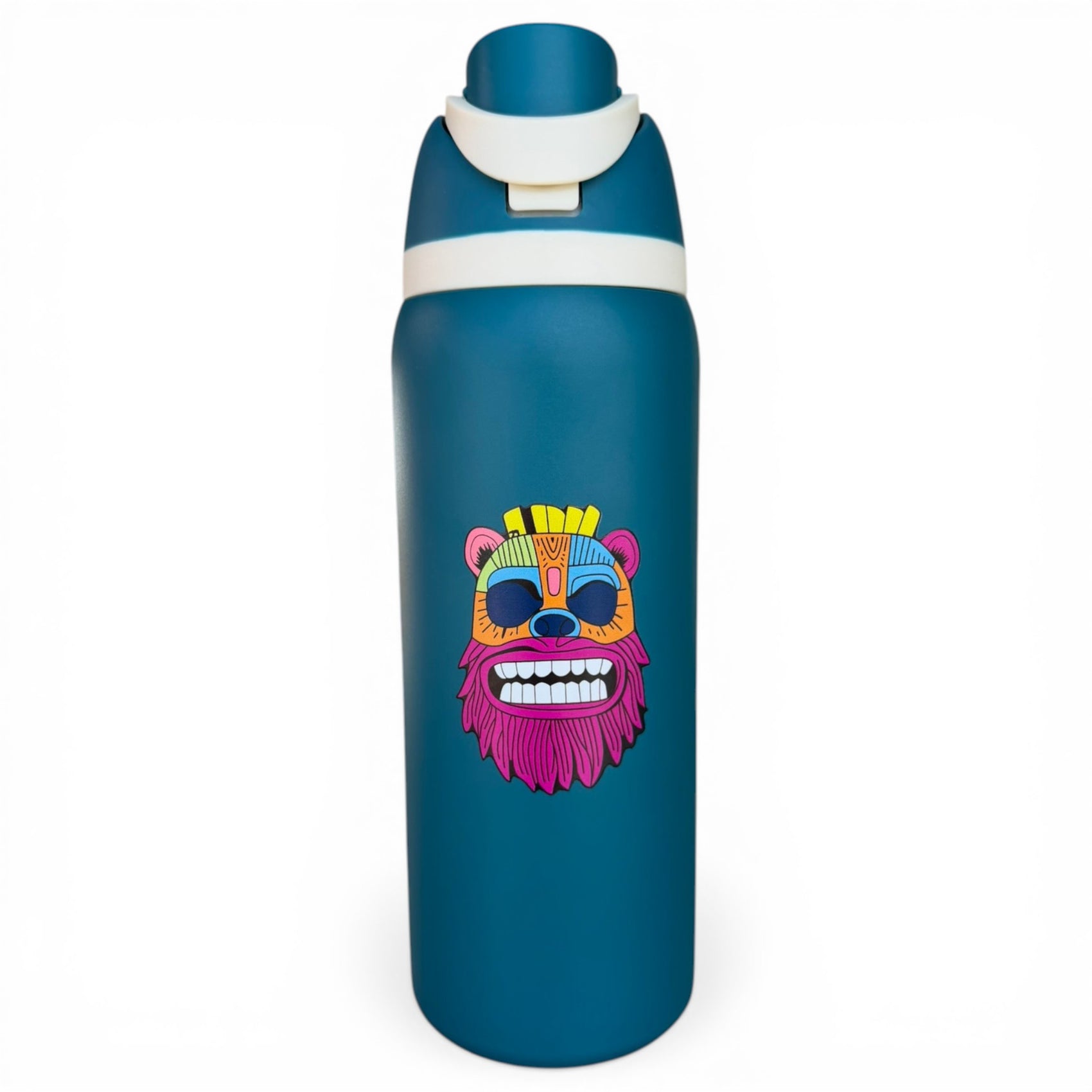 The Hydration Bottle – Tiki Bear is a 32oz insulated stainless steel water bottle with a white flip straw lid and handle, featuring a vibrant Tiki Bear sticker in yellow, blue, red, and pink tribal mask design.