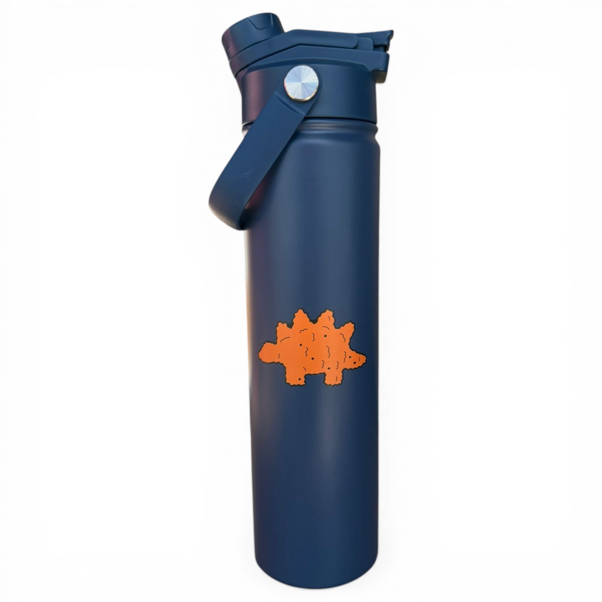 The Hydration Bottle – Dino Nugget is a 32oz insulated stainless steel bottle in dark blue, featuring an orange stegosaurus graphic, chug lid with wide mouth, and carrying handle—ideal for any Dino Nugget fan.