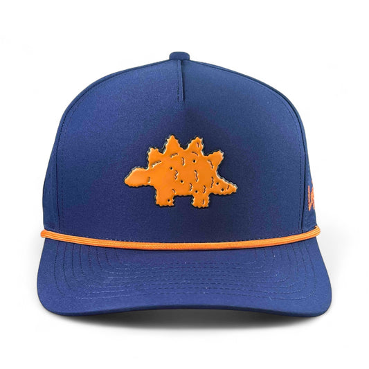 The Dino Nugget Golf Hat is a blue snapback cap featuring an orange embroidered Stegosaurus, orange brim trim, built-in magnetic ball marker holder with marker, and adjustable fit—a fun golfer accessory great for on or off the course.